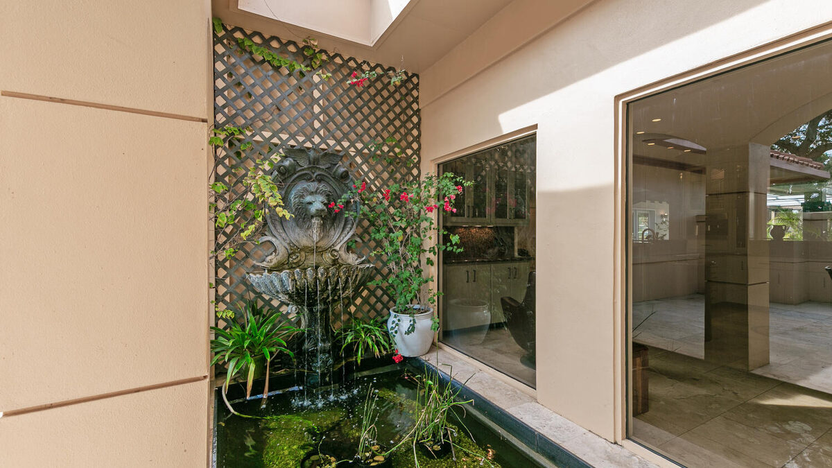 Courtyard water feature beside the entry