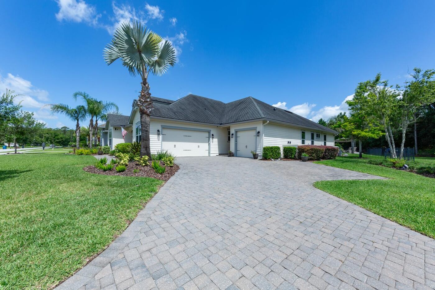 151 Littlewood Road &mdash; the drive and the palms