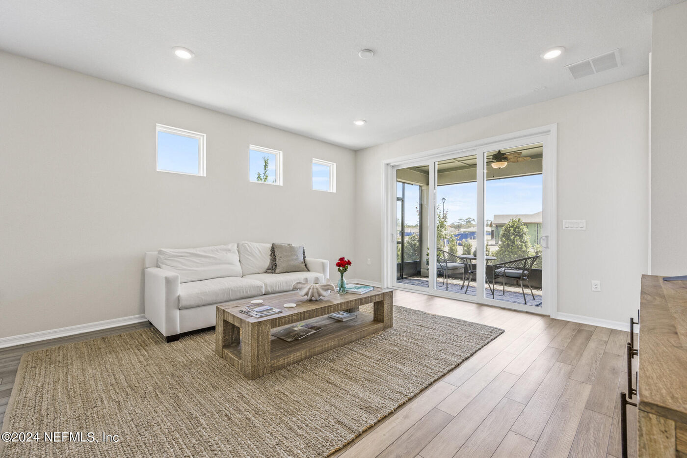 186 Curved Bay Trail &mdash; the living room, out to the lanai