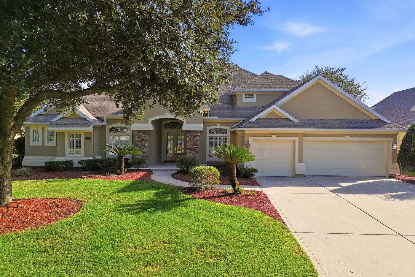 237 S Hampton Club Way — the front elevation and three-car garage