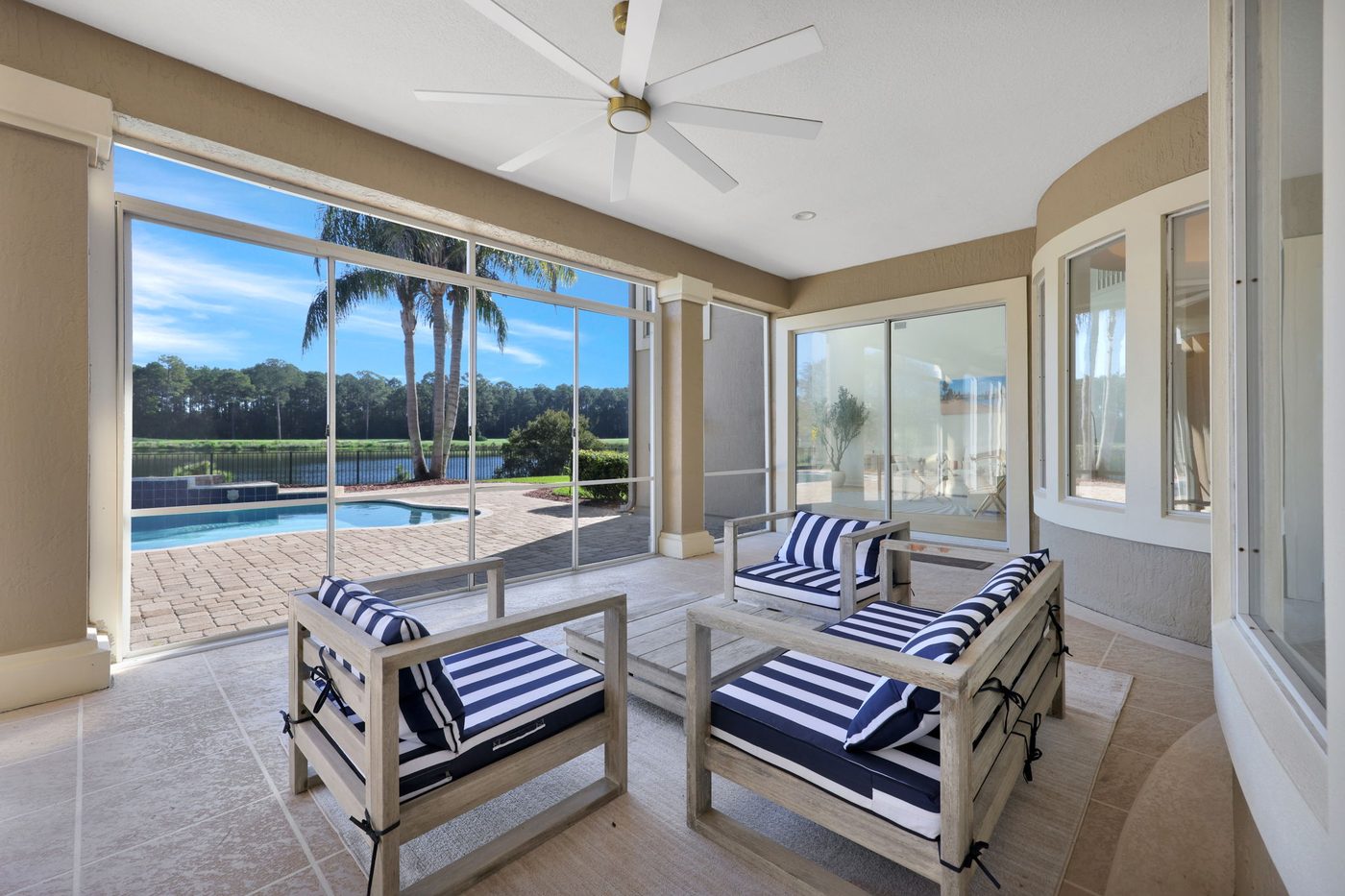 237 S Hampton Club Way — the covered, screened porch