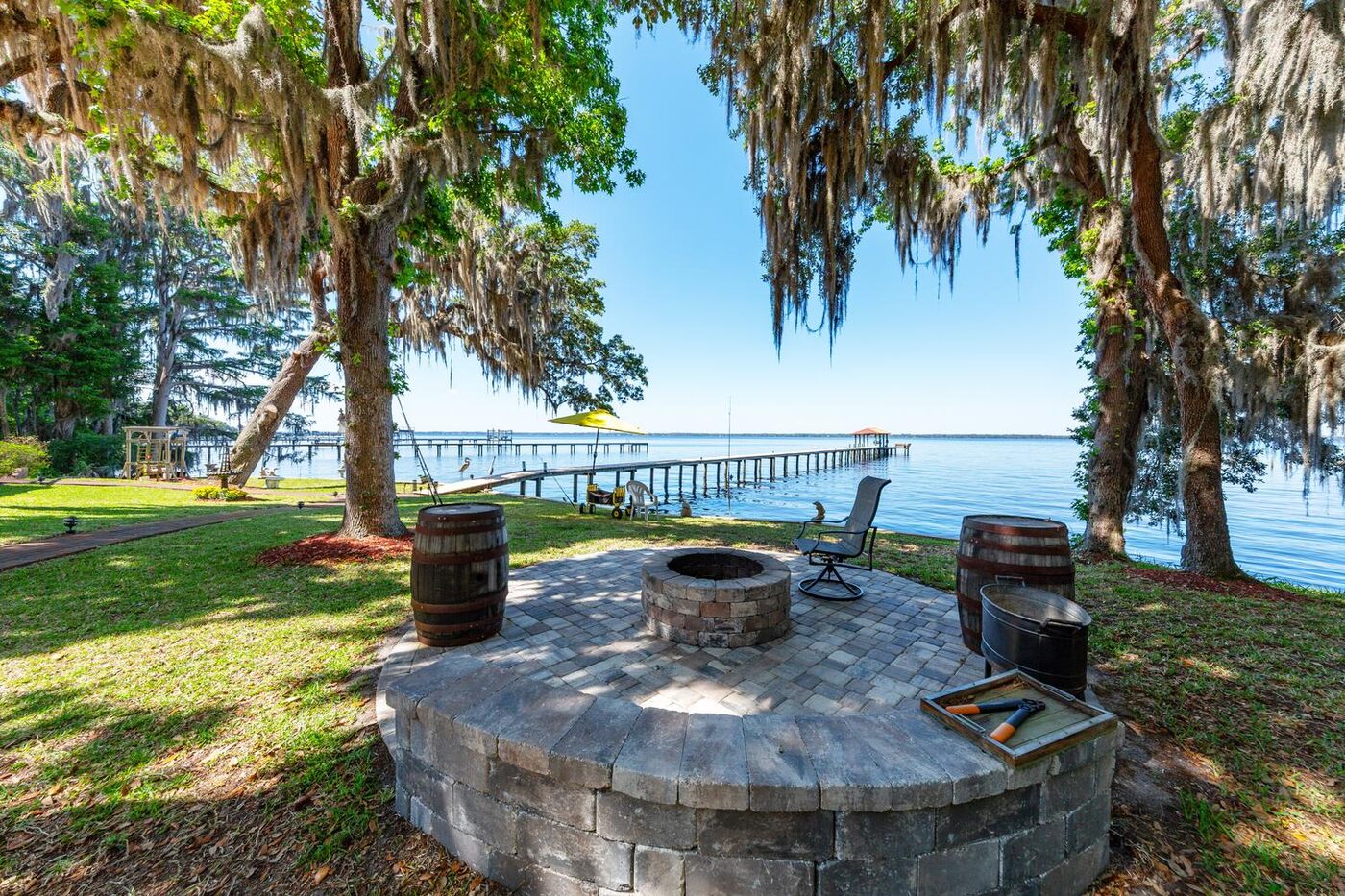 381 County Road 13 S &mdash; the fire pit under the oaks