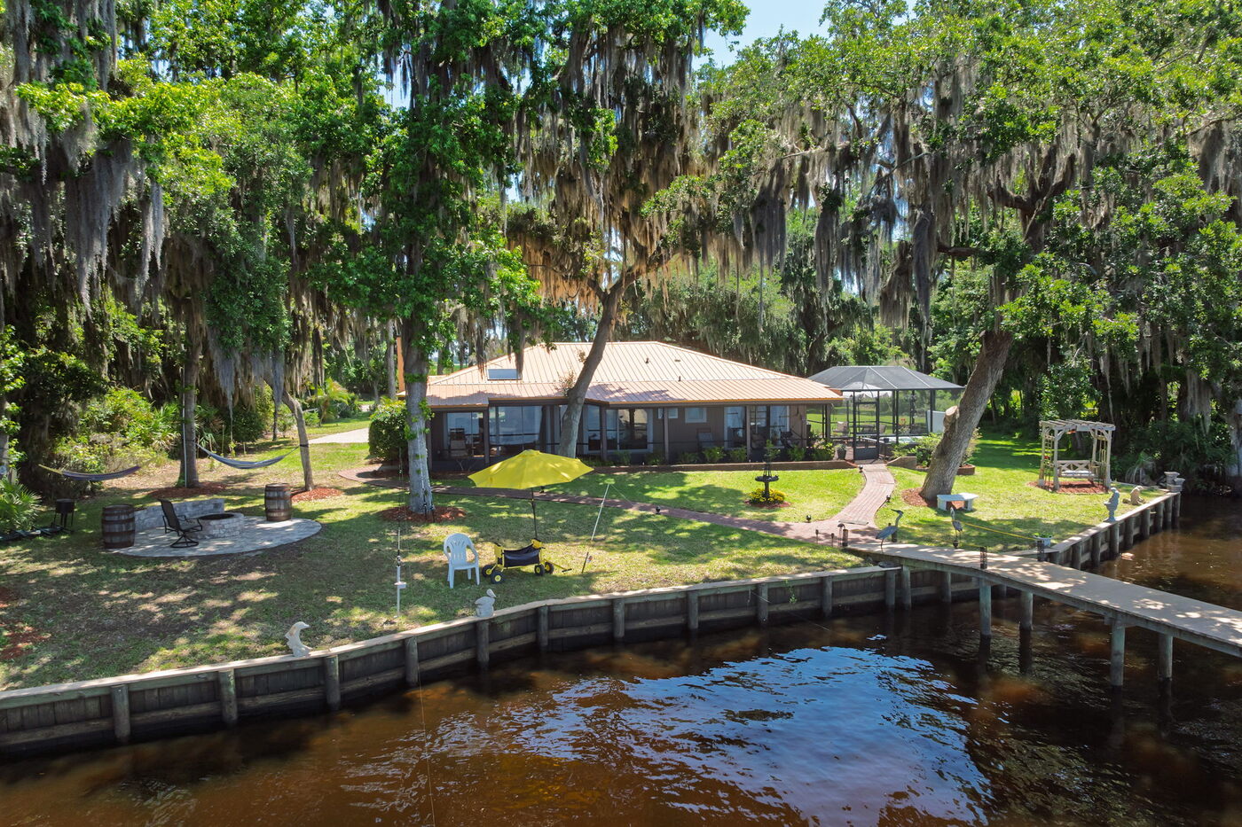 381 County Road 13 S &mdash; from the air &mdash; the house and the river