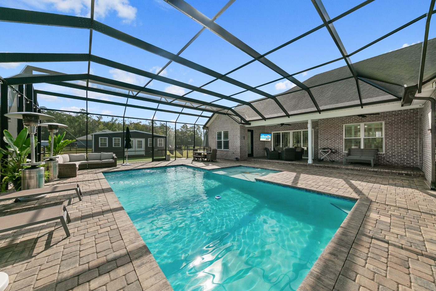 56057 Griffin Road &mdash; the screened pool and lanai