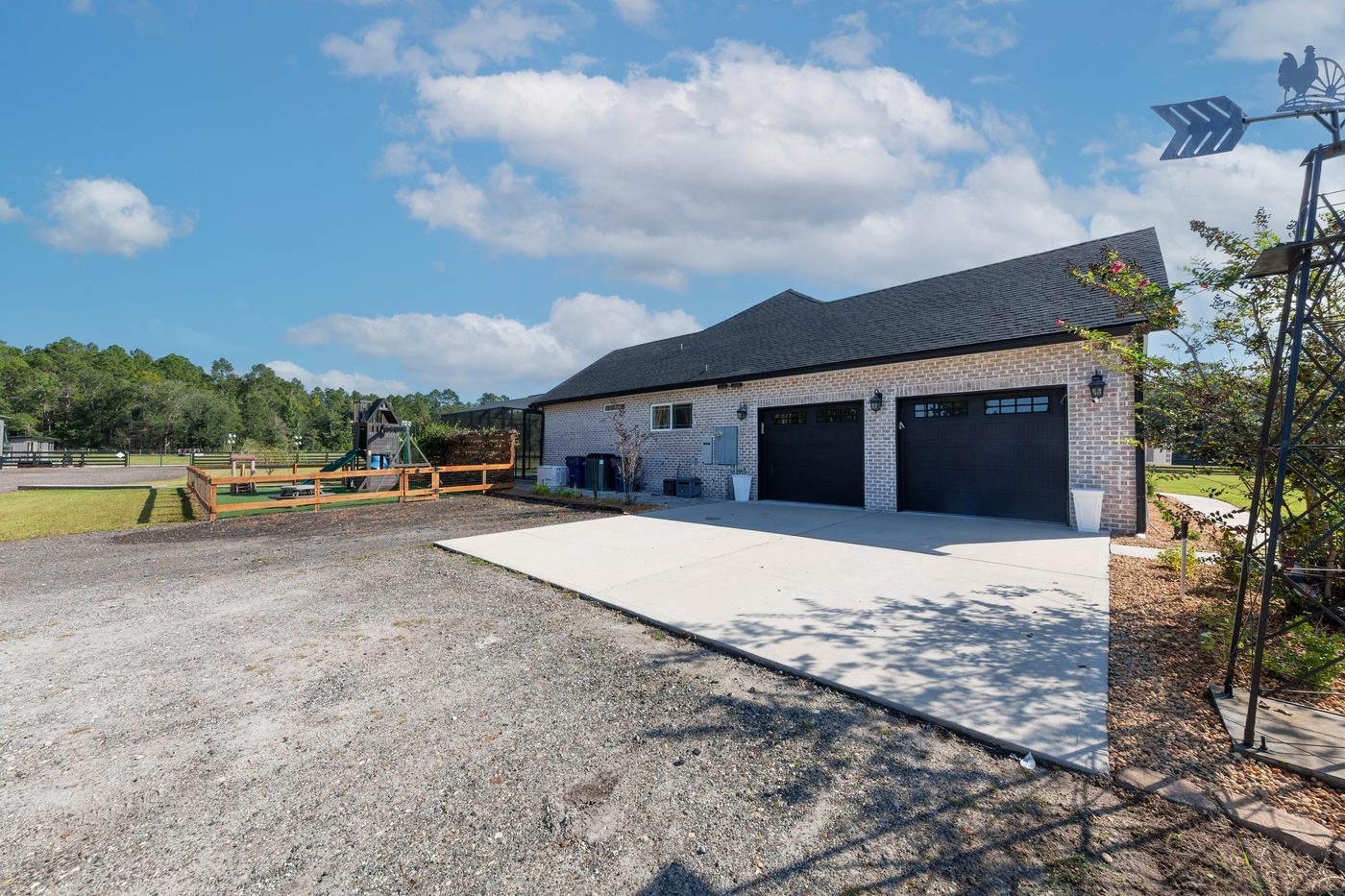 56057 Griffin Road &mdash; the garage side and the playground