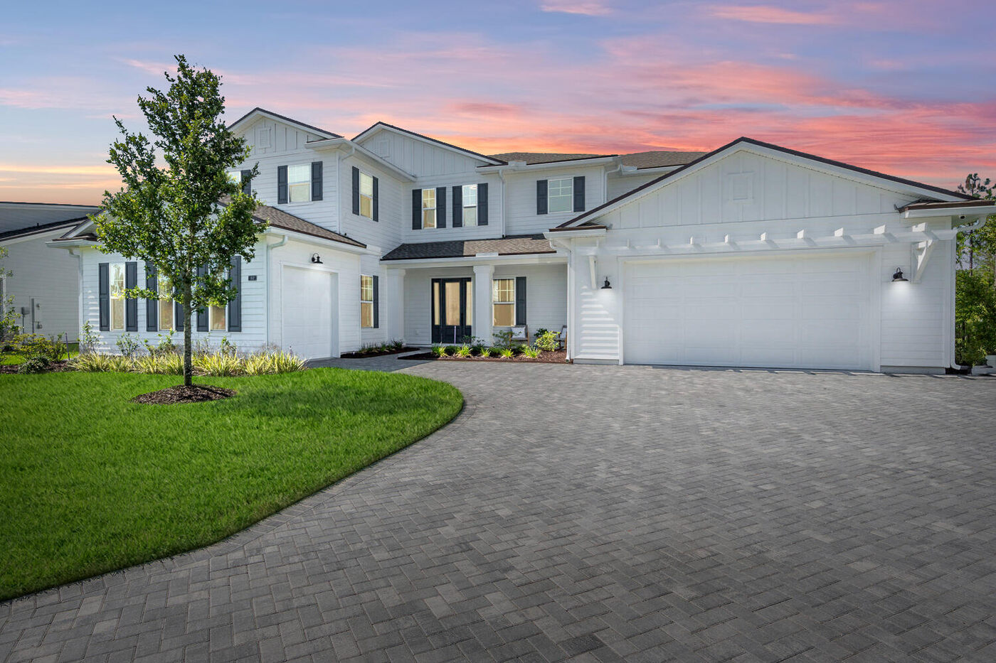 102 Morning Mist Lane &mdash; the front elevation at dusk