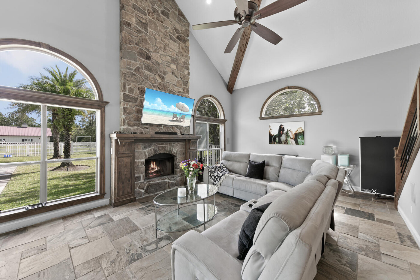 10680 Quail Ridge Drive — the living room, under its beams