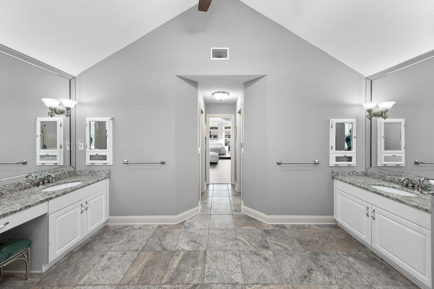 10680 Quail Ridge Drive — the primary bath, and the closet beyond