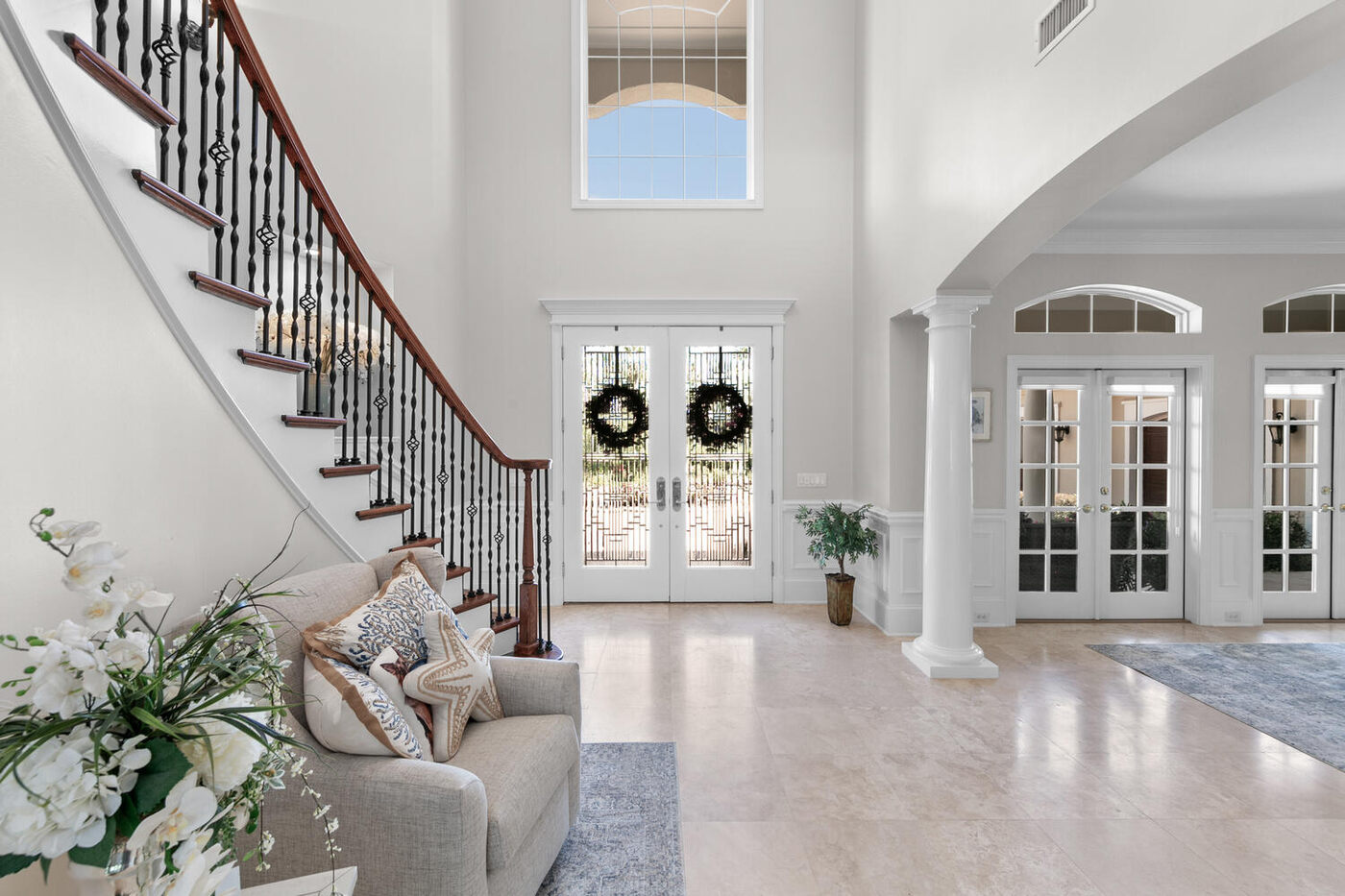 752 Promenade Pointe Drive — the foyer and the stair
