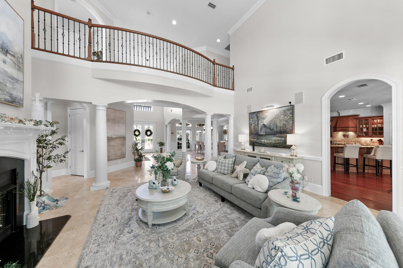 752 Promenade Pointe Drive — the two-storey living room