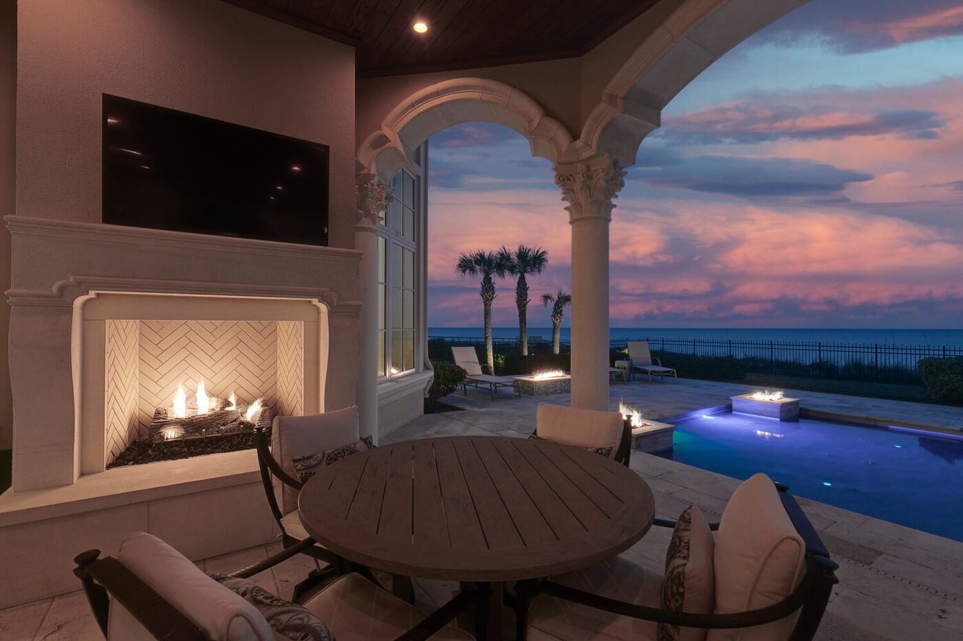 801 Ponte Vedra Boulevard &mdash; the arcade at dusk, the pool lit